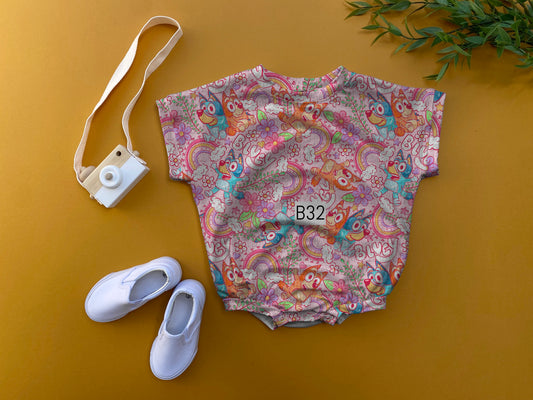 Pink rainbow oversized romper